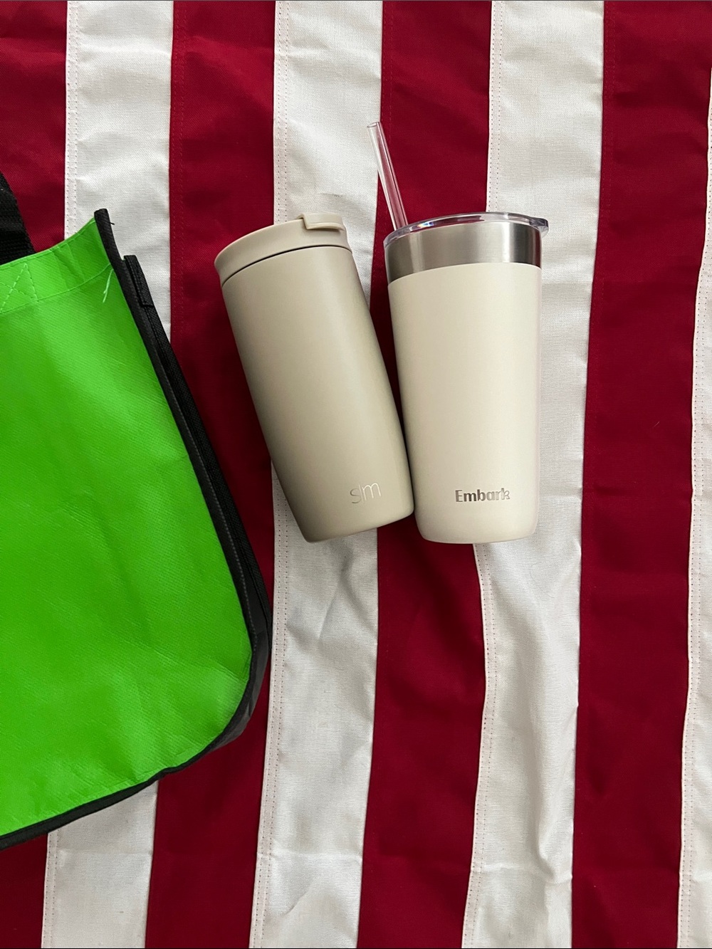 Two metallic tumblers